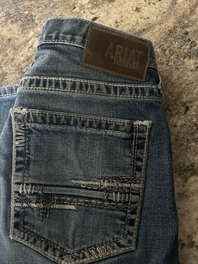 Ariat Men's Faded Blue Slim Straight Jeans with Distressed Back Pocket